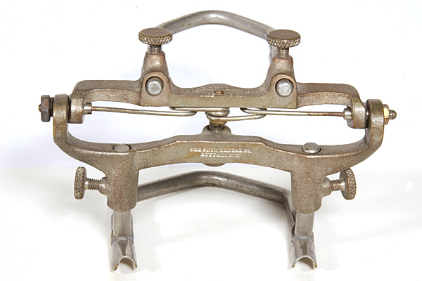 Posterior view showing the horizontal condylar tension spring used to retain the articulator in the centric position