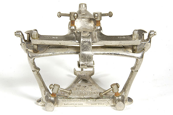 Posterior view, note center tension spring and extensions for a facebow