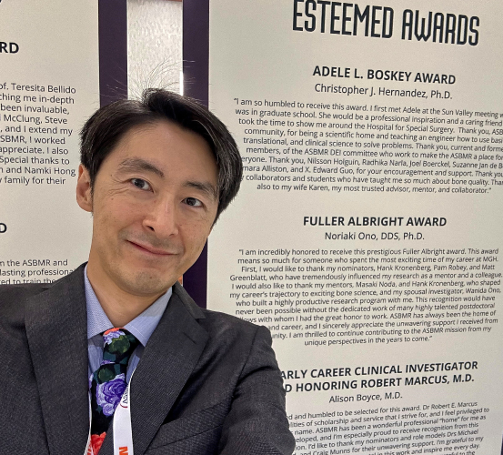 Selfie in front of award listing.
