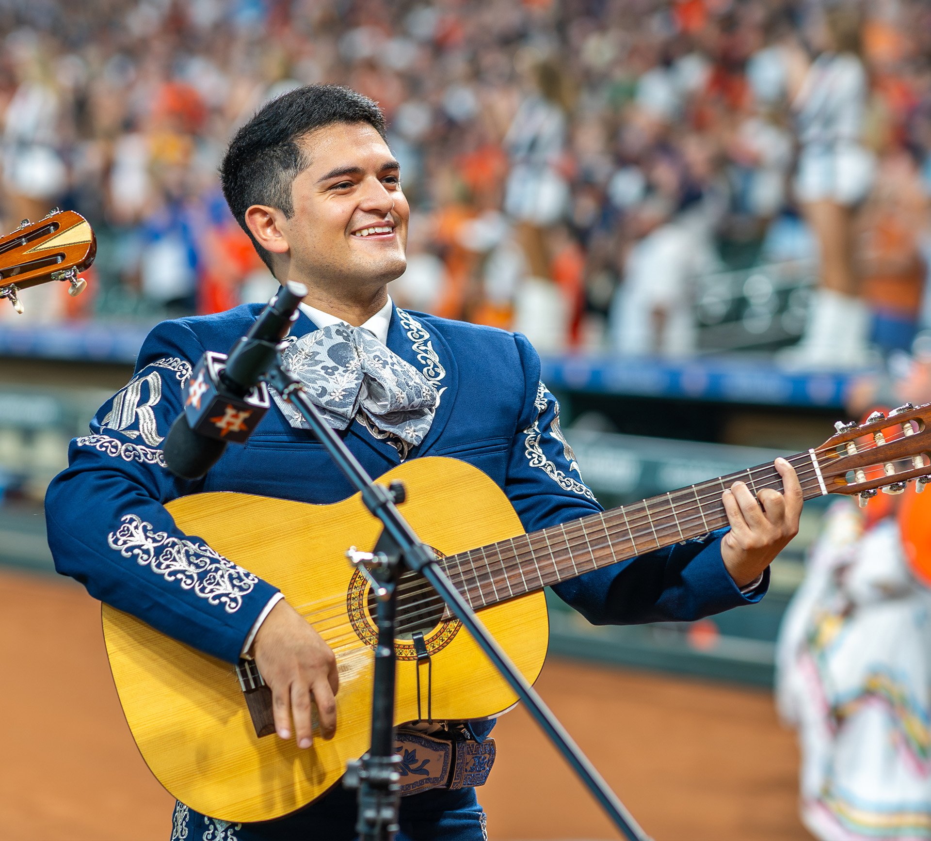 Dental student Cesar Zapata performs the national anthem with his mariachi band, Mariachi Luna Llena, as part of the Houston Astros’ Hispanic Heritage Month festivities on Sept. 23 at Minute Maid Park. Photo courtesy of Rice University.