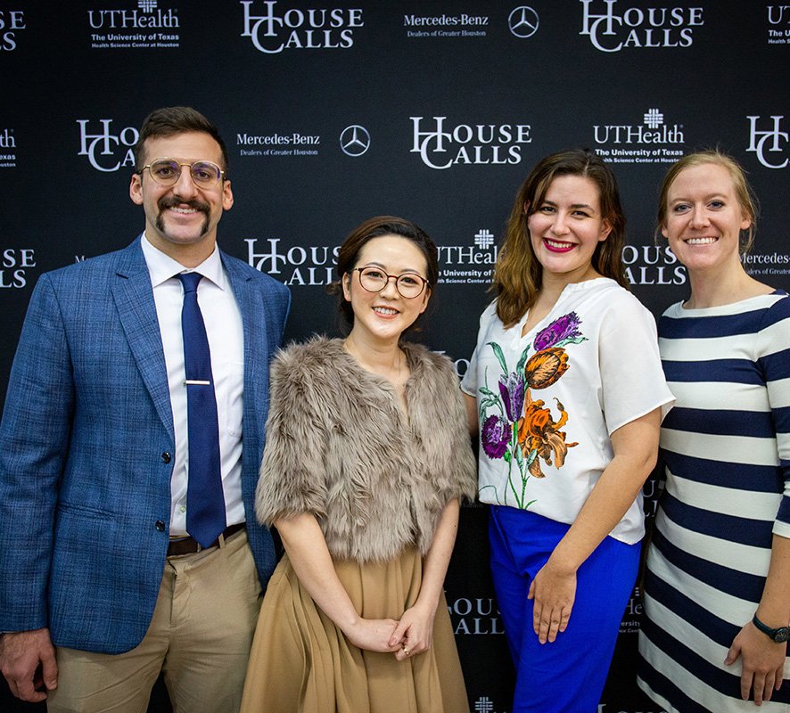 From left: Dental students and scholarship recipients Jared Stergar and Bridget Huynh attended a House Calls event in November, along with Student InterCouncil Secretary Micaela Sandoval and SIC President Tristen Tellman.