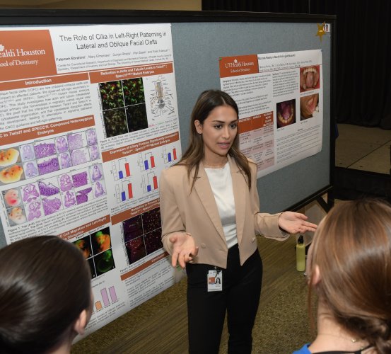 Student presents research findings in front of peers.