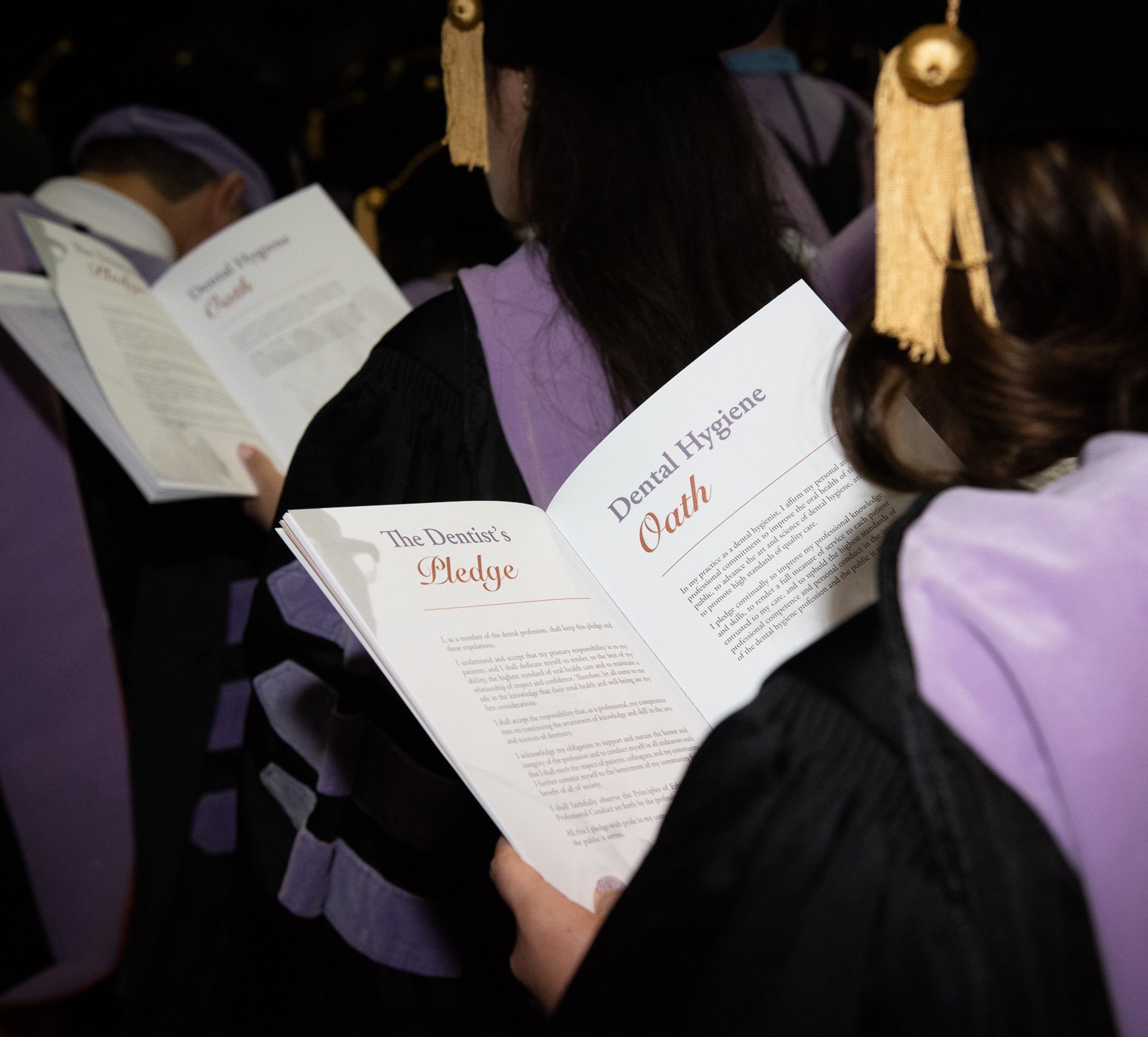 An over-the-should look at The Dentist’s Pledge and the Dental Hygiene Oath in the 118th Commencement Ceremony program.