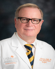 Dr. Clark Whitmire, DMD, JD