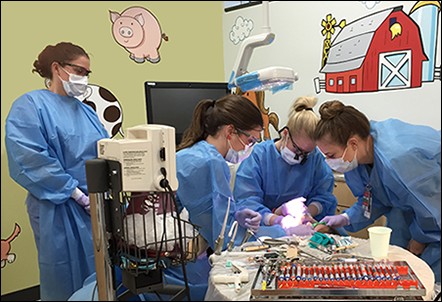 Pediatric Residents and Faculty with Patient