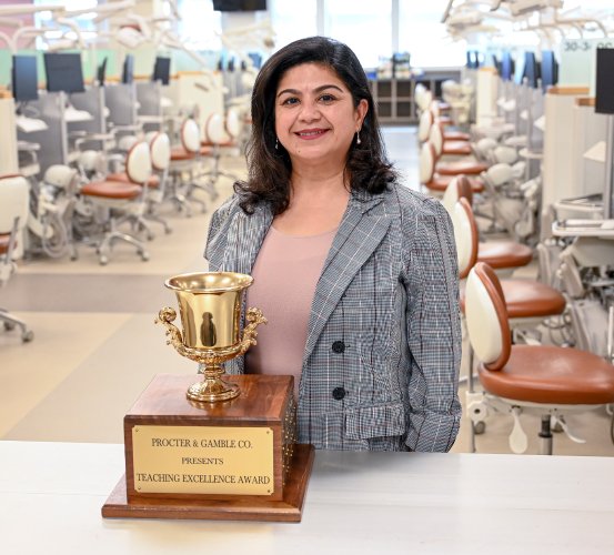 Assistant Professor Khairunisa Hashmani, RDH, EdD, of UTHealth Houston School of Dentistry with the Procter & Gamble Teaching Excellence Award. She is the 2024 recipient. Photo by Dylan Allen.