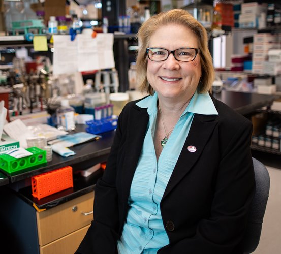 Dr. Mary (Cindy) Farach-Carson sits in her lab.