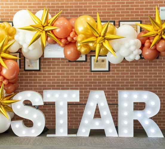 Large light-up sign reading 
