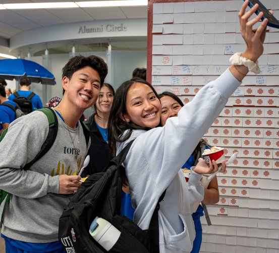 Group of students pose for a selfie.