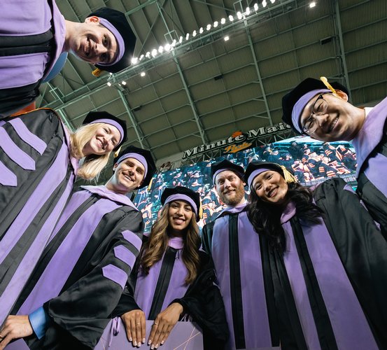 UTHealth Houston Class of 2022 dental graduates gather for a group photo after the ceremony on May 14 at Minute Maid Park.
