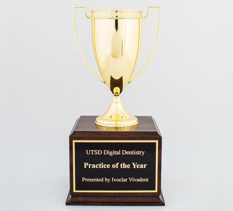 UTSD Digital Dentistry Practice of the Year trophy.
