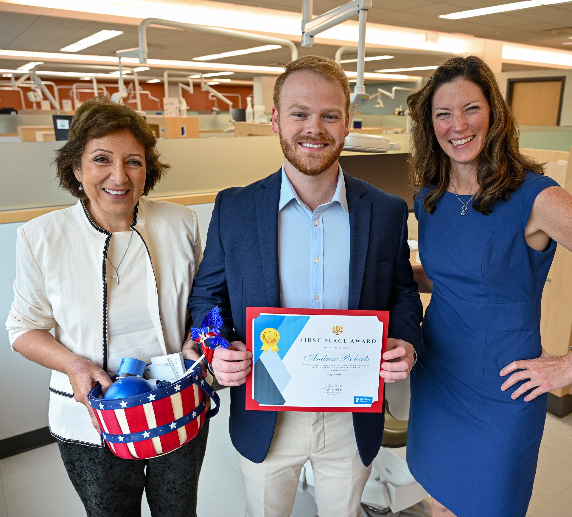 Andrew Roberts, DDS ’24 (center), presented his Global Clinical Case Contest for the North America Region certificate. Pictured with faculty mentor Dr. Magda Eldiwany (left) and Katelyn Higgs of Dentsply Sirona.