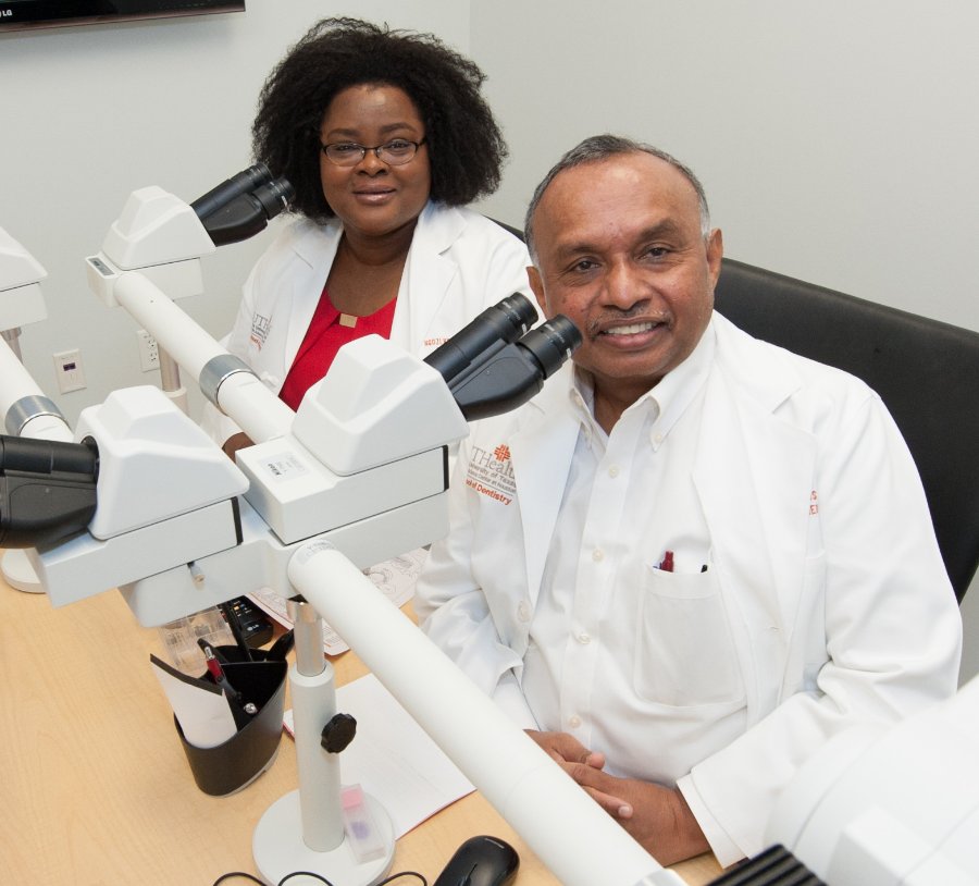 Pathology professors Ngozi Nwizu (left) and Nadarajah Vigneswaran