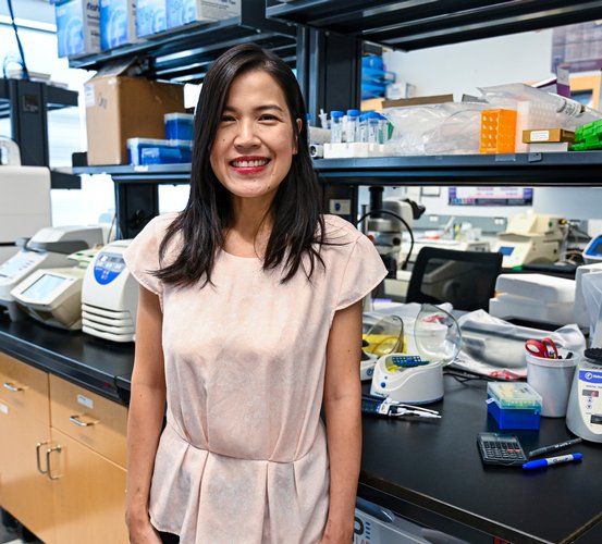 Dr. Wanida Ono poses in her laboratory.