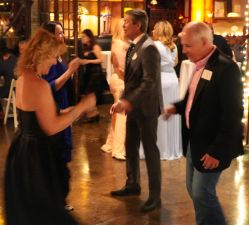 People dancing at alumni dental prom.