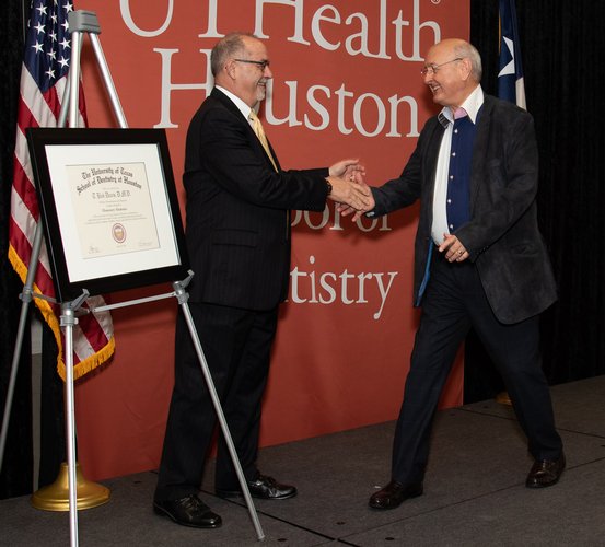 Dr. T. Bob Davis (right) was honored with the distinction of Honorary Alumnus of UTHealth Houston School of Dentistry during the annual DDS Senior Awards.