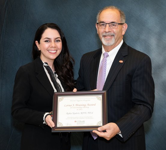 Clinical Assistant Professor Raha Naderi, RDH, was presented a framed certificate by Dean John Valenza, DDS, during UTHealth School of Dentistry’s annual Dental Hygiene Awards in May.