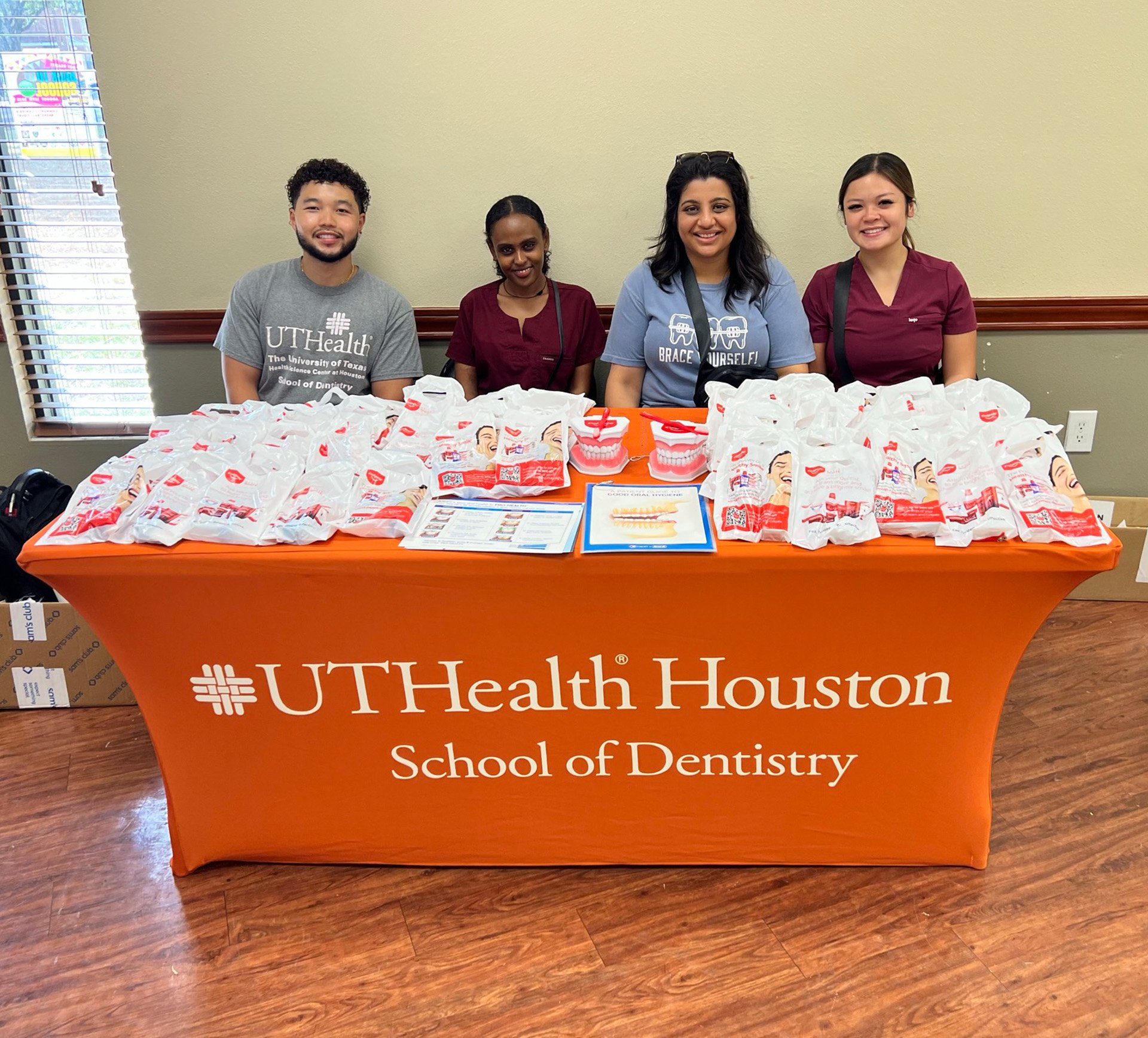 Dental Hygiene students at a back-to-school event at Cuney Homes.