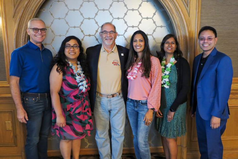 2023 Dean’s Excellence Awards recipients with Dean John A. Valenza (middle left). Valenza announced the award recipients in July during the Summer Faculty Retreat.