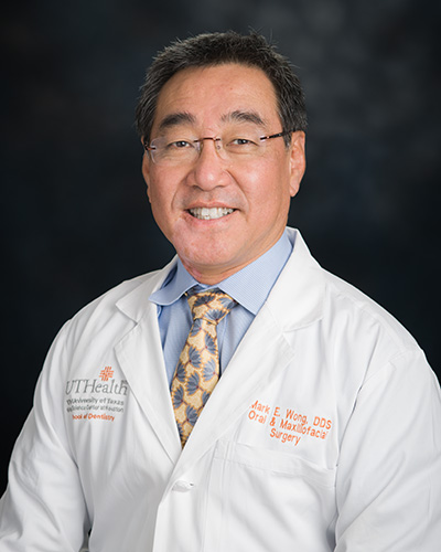 Portrait headshot of Mark E. K. Wong, DDS