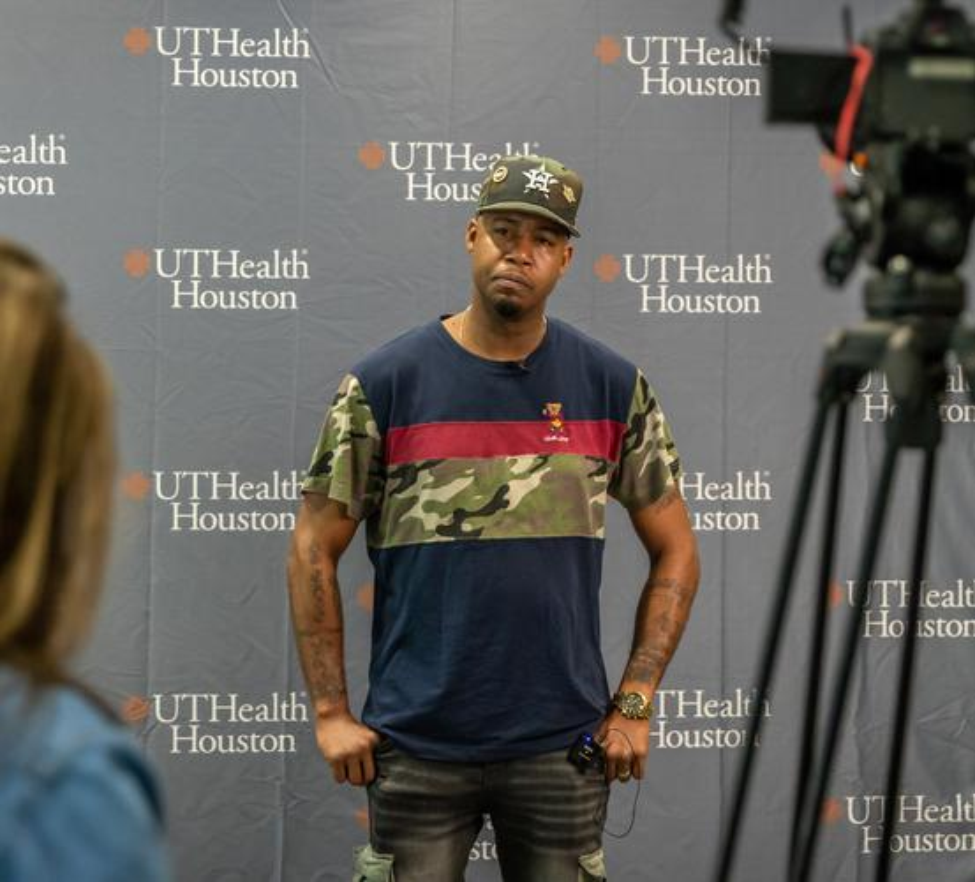 U.S. Army veteran Carlton Johnson speaks with media. He was one of 80 veterans seen during the 8th Annual Give Vets a Smile.