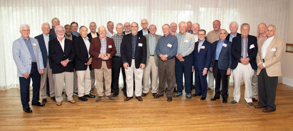 Dean John A. Valenza, DDS ’81, with the DDS Class of 1973 during their reception at Brennan’s Houston.