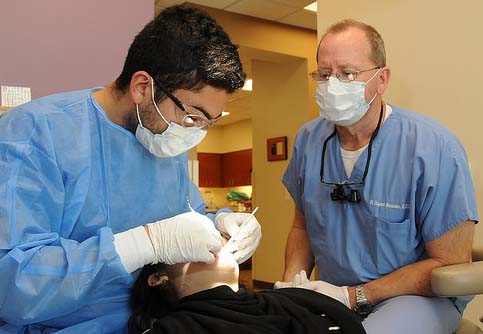 Student and Faculty in Clinic