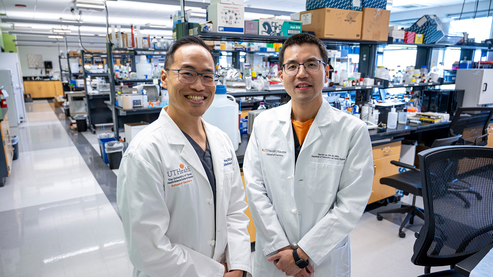 Two dentists posing for a photo