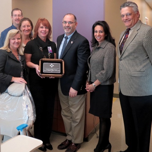 From left are San Jose Clinic Chief Financial Officer Lee Ann Kroon, UTSD Technical Services Manager Jonathan Green, SJC President Paule Anne Lewis, Dental Services Director Estelle Luckenbach, UTSD Dean John Valenza, DDS; Community Outreach Director Margo Melchor, RDH; and Executive Director of Development John Greer.